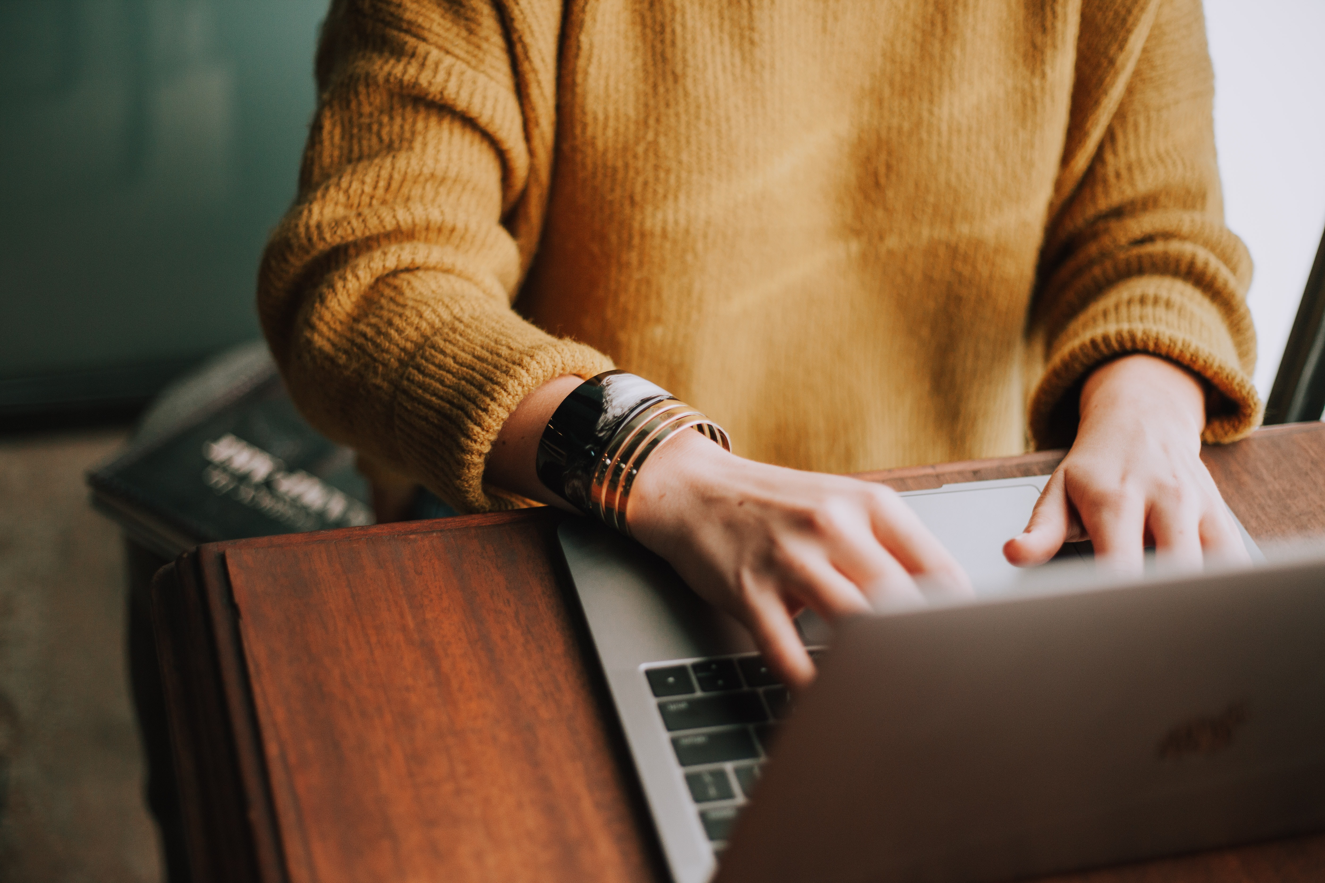 Person typing on computer